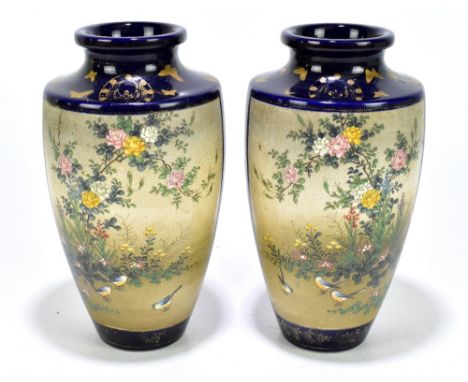 A pair of Japanese Satsuma vases decorated with birds in gardens, red seal mark to underside of base, height 24cm.&nbsp;Addit