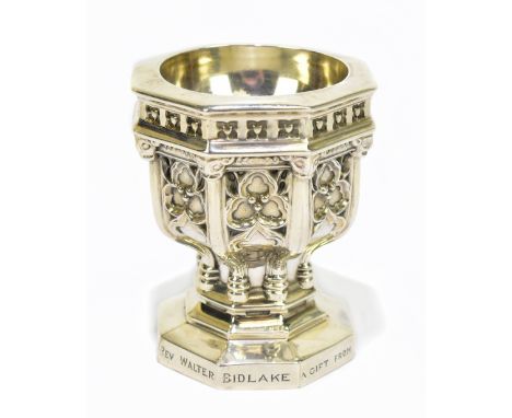 HENRY WILKINSON; a late Victorian hallmarked silver novelty open salt, modelled as a church font with inscription to base, 'R