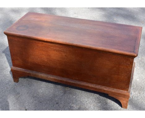 An early 20th century oak blanket box with hinged top, on bracket feet, height 50cm, width 101cm, depth 42cm.
Additional Info