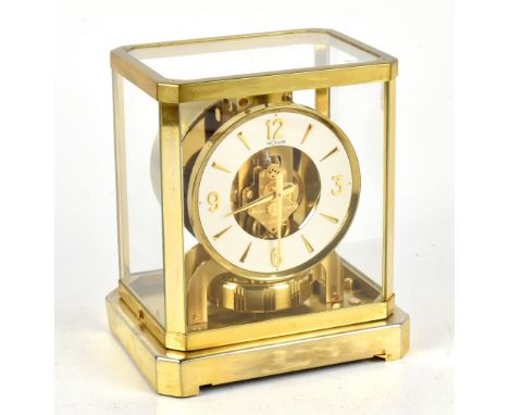 JAEGER LE COULTRE; a brass cased Atmos clock, the chapter ring with quarterly Arabic numerals, height 23.5cm.