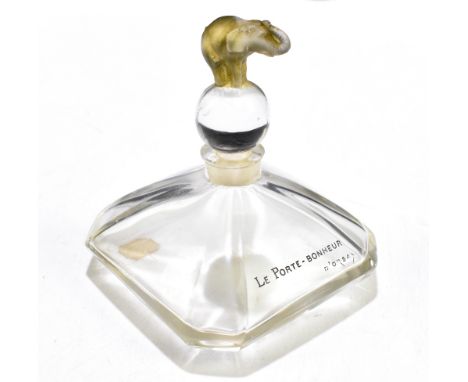 BACCARAT; a clear glass perfume bottle and stopper, the stopper modelled with an elephant to the finial, stamped Le Porte-Bon