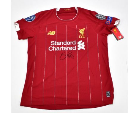 SADIO MANE; a Liverpool Premier League winners home shirt, signed to the front, size 14.Additional InformationCreasing and li
