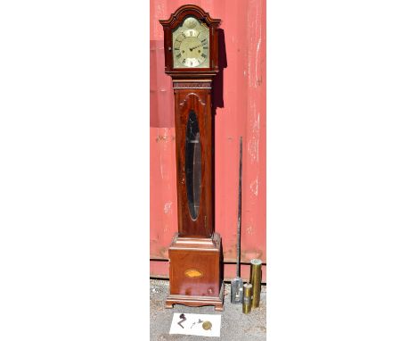 An early 20th century mahogany longcase clock of small proportions, the silvered dial with chased scrolling decoration and ap