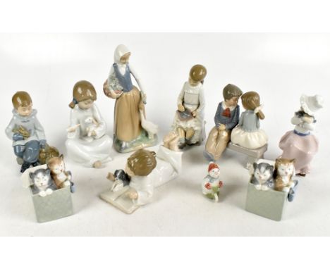 NAO; a collection of nine ceramic figures and models, including a maiden with a duck, a girl feeding a lamb, a boy and a pupp