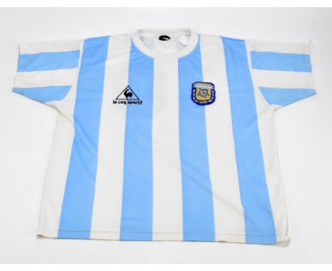 DIEGO MARADONA; a 1986 Argentina shirt, signed to the reverse, size XL.Additional InformationCreasing and light general wear,