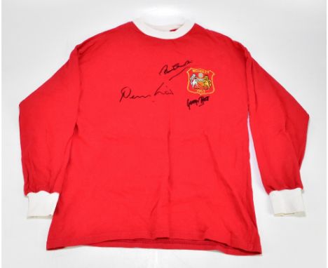 MANCHESTER UNITED; a 1963 home shirt, signed to the front by Law, Charlton and Best, size M.Additional InformationCreasing an