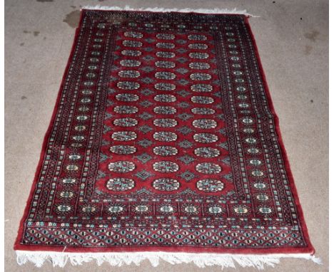 A Bokhara wool rug, worked with rows of gulls against a red ground, 178 x 123cm.&nbsp;Additional InformationGeneral light wea