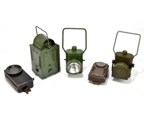 A military issue bicycle lamp, stamped 'Lamps Electrical No.1 C.C.C' and with military arrow, with four vintage bicycle lamps