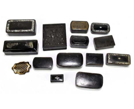 A collection of Georgian and Victorian papier-mâché snuff boxes, including examples with mother of pearl inlay, etc, also a s