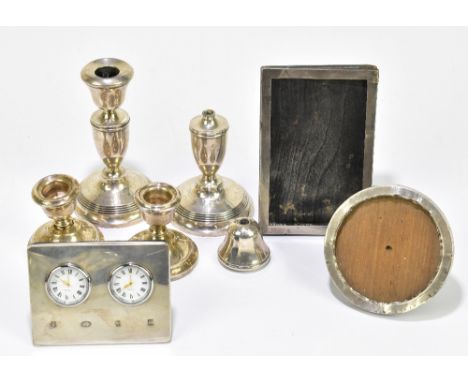 A.T CANNON LTD; a pair of Elizabeth II hallmarked silver squat candlesticks with a cast beaded rim, Birmingham 1972, a furthe
