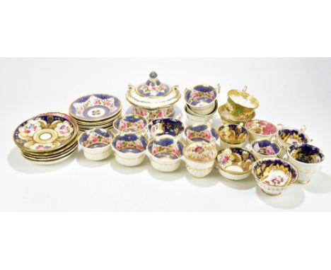 A collection of 19th century porcelain teacups and saucers including an example in the manner of Rockingham with hand painted