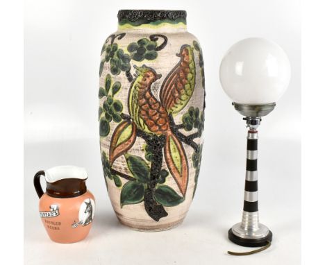 A West German pottery vase decorated with stylised floral detail, height 51cm, a Whitbread's Bottled Beers advertising jug, a