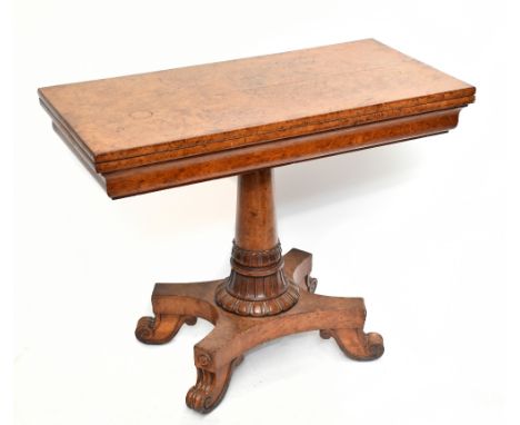 A 19th century burr oak fold over swivel-top card table, the rectangular top on a turned column support, width 92cm, depth 45