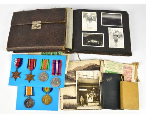 A WWI and WWII family medal and ephemera group, comprising BWM and VM to 51801 Pte A.J.F Dignan, The Queens R, (misspelt Dign