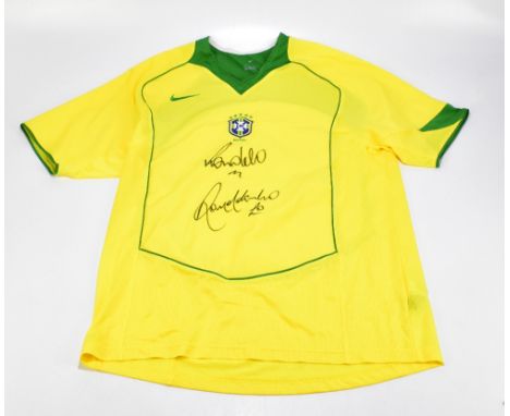BRAZIL; a 2004 shirt, signed to the front by Ronaldo and Ronaldinho, size L.Additional InformationCreasing and light general 