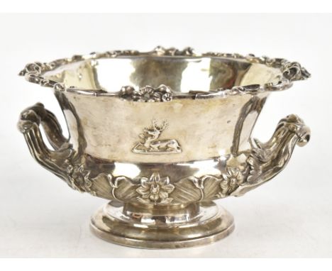 CHARLES REILY &amp; GEORGE STORER; a Victorian hallmarked silver Warwick style vase, with engraved garter type belt and embos