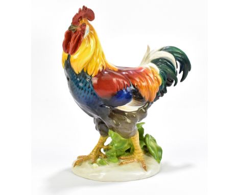 MEISSEN; a porcelain model of cockerel, V130, height 16cm.Additional InformationRestoration to the tail feathers and to the c