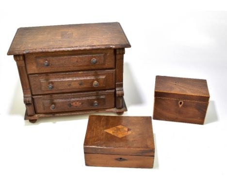 A Georgian mahogany tea caddy of rectangular form, width 17cm, height 11.5cm, a 19th century inlaid mahogany work box and a l