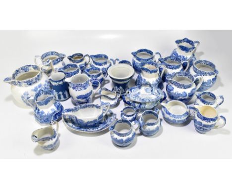 A collection of mainly 20th century blue and white Spode jugs of various patterns, and two pieces of Wedgwood.