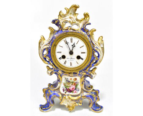 A late 19th century French porcelain floral painted gilt heightened mantel clock, with circular dial set with Roman numerals,