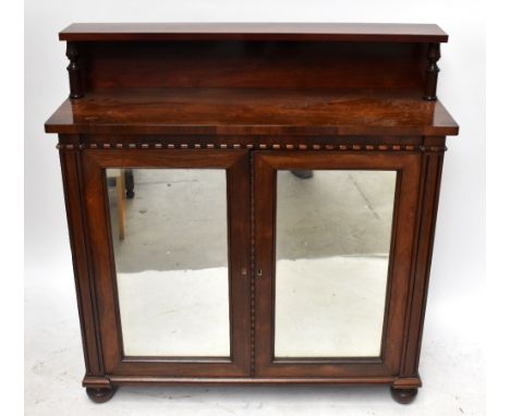 A William IV rosewood chiffonier, with raised single shelf back above two mirrored doors, on turned legs, height 110cm, width