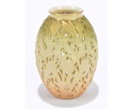 ROYAL WORCESTER; an ovoid shaped reticulated vase with floral decoration, green painted marks to the underside, height 10cm.A