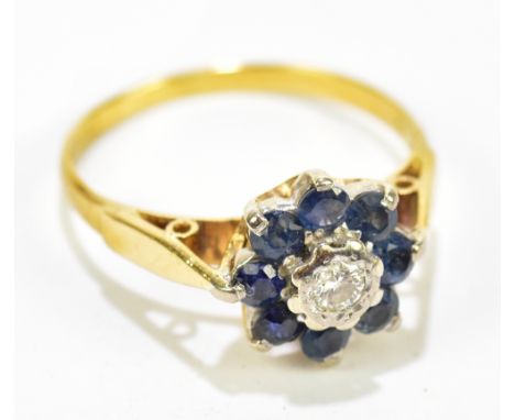 An 18ct yellow gold diamond and sapphire floral dress ring, approx. size I.Additional InformationThe marks are heavily worn, 