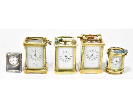 MAPPIN &amp; WEBB LTD; a brass cased carriage clock with swan neck handle, the enamelled dial set with Roman numerals, height