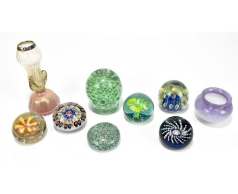 Seven Victorian and later paperweights including a Victorian dump with bubble decoration, height 9.5cm, a Scottish Art Glass 