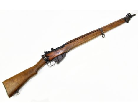 LEE ENFIELD;&nbsp; a deactivated American issued Savage No.4 MKI .303 bolt action fully stocked rifle, the back strap inscrib