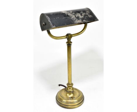 A 19th century brass desk lamp, with black painted rotating shade, height 47cm.