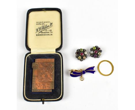 A cased WWII army badge, also a yellow metal and blue enamel brooch and a pair of clip-on earrings.