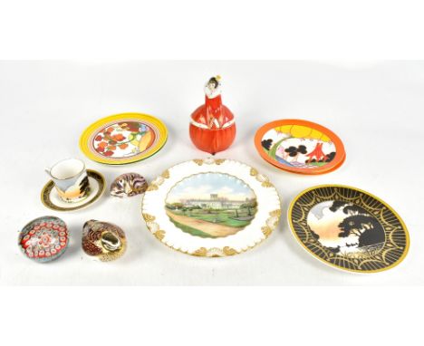 ROYAL CROWN DERBY; two animal paperweights including a kitten asleep, with four Wedgwood collectors' plates after Clarice Cli