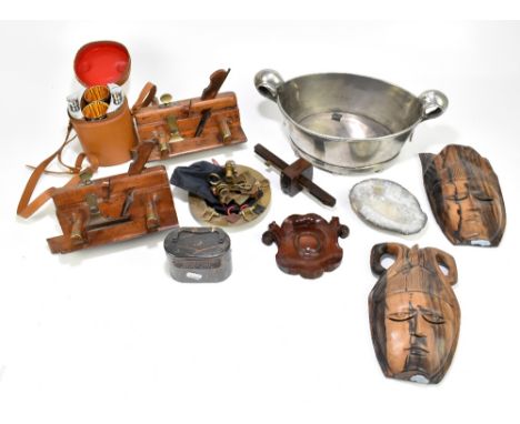 A group of collectors' items including a pair of planes, pair of wall masks, oval planter, reproduction scientific instrument