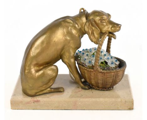 An early 20th century French gilt spelter table lamp modelled as a dog with a basket of flowers, on marble base, length 24cm.