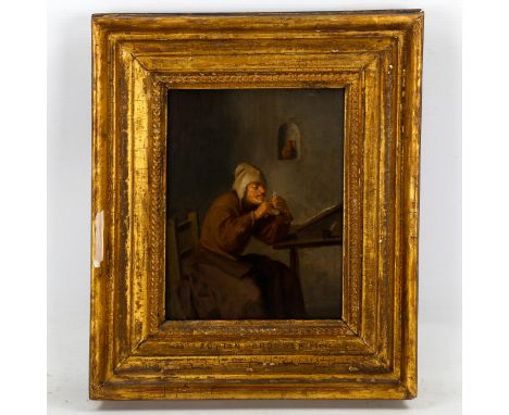Attributed to Adrian Brouwer (1608 - 1640), oil on wood panel, man at writing desk, unsigned, inscribed on frame, indistinct 