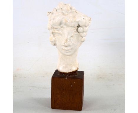 Eve Castle, white glaze ceramic sculpture, Classical head study on woodblock base, height 16cmGlaze has a small chip on the n