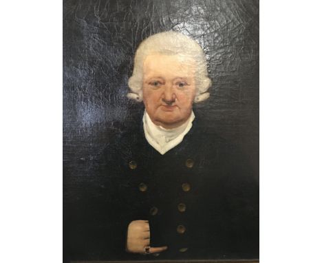 A late 18th century oil painting on canvas unframed portrait of a Gentleman. 45x35cm The reverse with an inscription John Rob