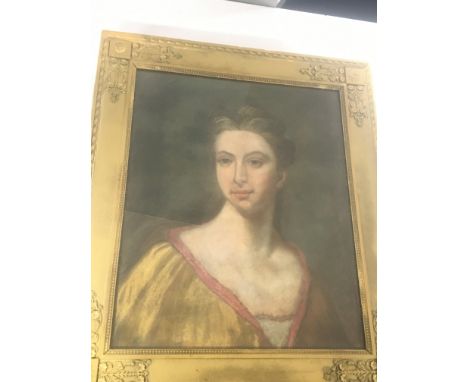 A framed early 19th century pastel portrait of an elegant lady. Unsigned and unattributed. 64x54cm