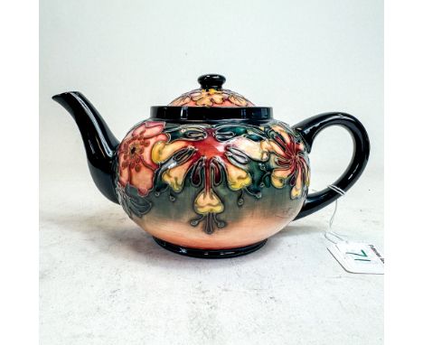 Moorcroft teapot decorated in the Oberon design, h.13cm. 