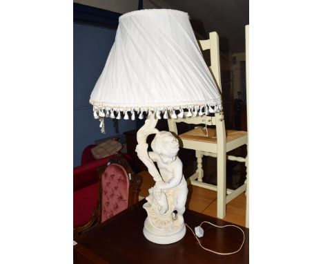 TABLE LAMP, THE PLASTER FINISH BASE FORMED AS A CHERUB, COMPLETE WITH SHADE