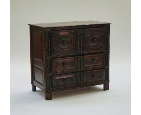 A Charles II oak chestWith three split bobbin and raised geometric moulded drawers, 97cm wide; 91 high; 53cm deep