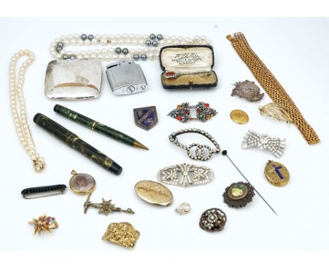 A 15ct gold oval brooch and further jewellery (qty)Comprising; three further gold brooches, various bead and other necklaces,