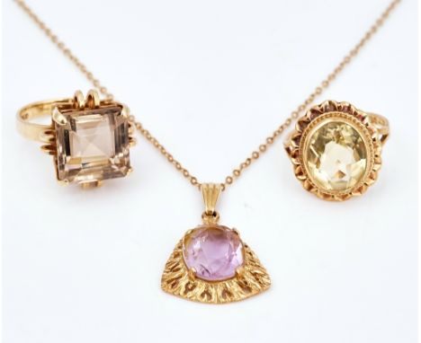 An amethyst pendant necklace, a citrine ring and a smoky quartz ring (3)The 9ct gold and amethyst single stone pendant pierce