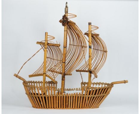 A bamboo and cane hanging light modelled as three-mast shipModernWith four light fittings in the hull&nbsp;107cm wide; 99cm h