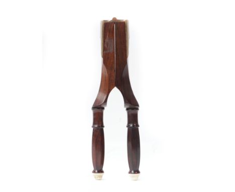 A rosewood 'press'/'squeezer'Mid 19th CenturyThe brass hinge stamped 'WILL &amp; FINCK S.F. CAL', the handles terminating wit