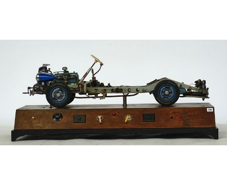 A large-scale instructional model carBy Hohm Models, German, Circa 1960mounted on a control panel base, with an applied plaqu