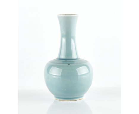 A small Chinese clair-de-lune glazed vaseblue six character Kangxi mark but laterbulbous body beneath a gently waisted neck, 