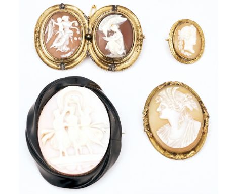 A twin cameo brooch and three further cameo brooches (4)The Victorian twin cameo brooch glazed with photographic locket compa