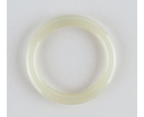 A Chinese white jade banglethe stone of even tone, 7.75cm overall diameterGood condition